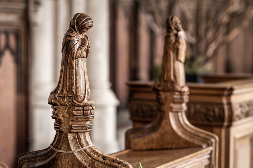 Wooden figure praying