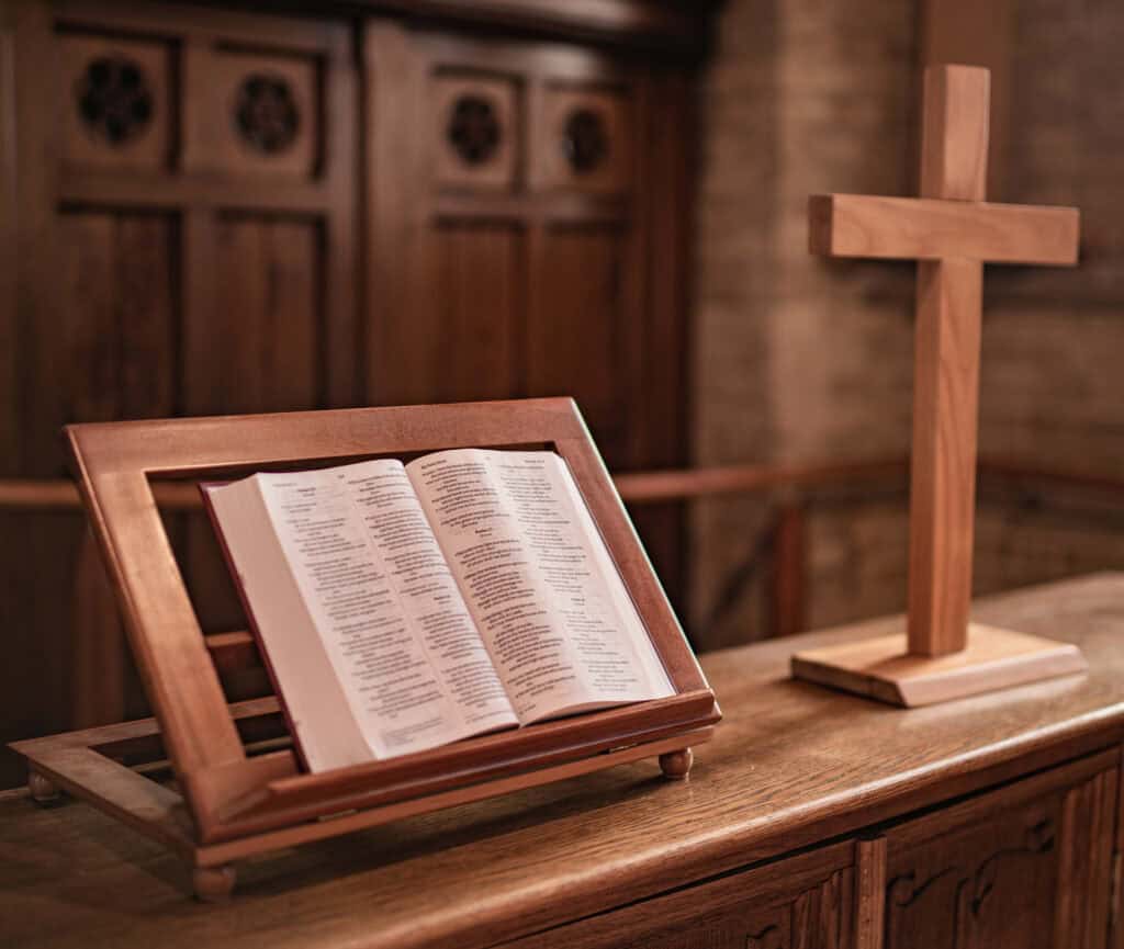 Bible and cross on altar