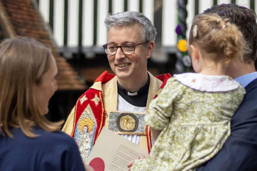 Archdeacon of St Albans Charles Hudson smiling